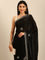 Black shimmer tissue saree with cut Dana & Swarovski embroidery