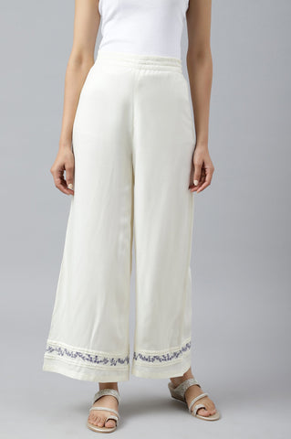 Ecru Embroidered Rayon Parallel Pants With Pleats.