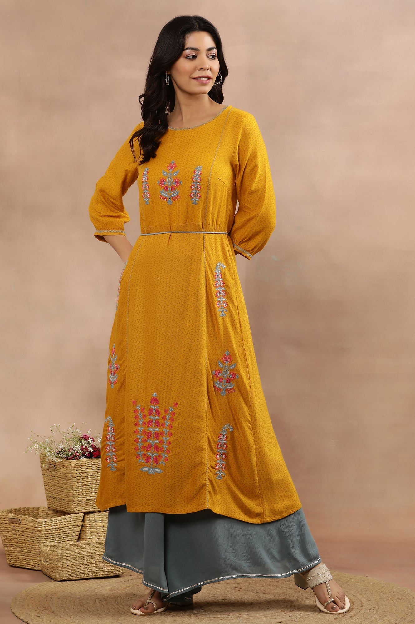 Yellow Embroidered Flared Kurta And Flared Pants Set