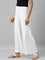 Women Solid White Viscose Mid Rise Knit Palazzos