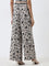 LOV Beige Floral Patterned Mid-Rise Palazzos