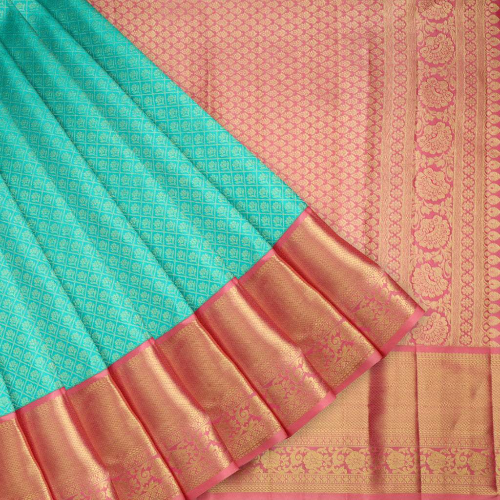 Turquoise Blue Kanjivaram Silk Saree With Floral Buttis