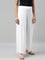 Women Solid White Viscose Mid Rise Knit Palazzos