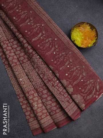 Chanderi silk cotton saree pastel maroon and beige with allover prints & mirror work and printed border