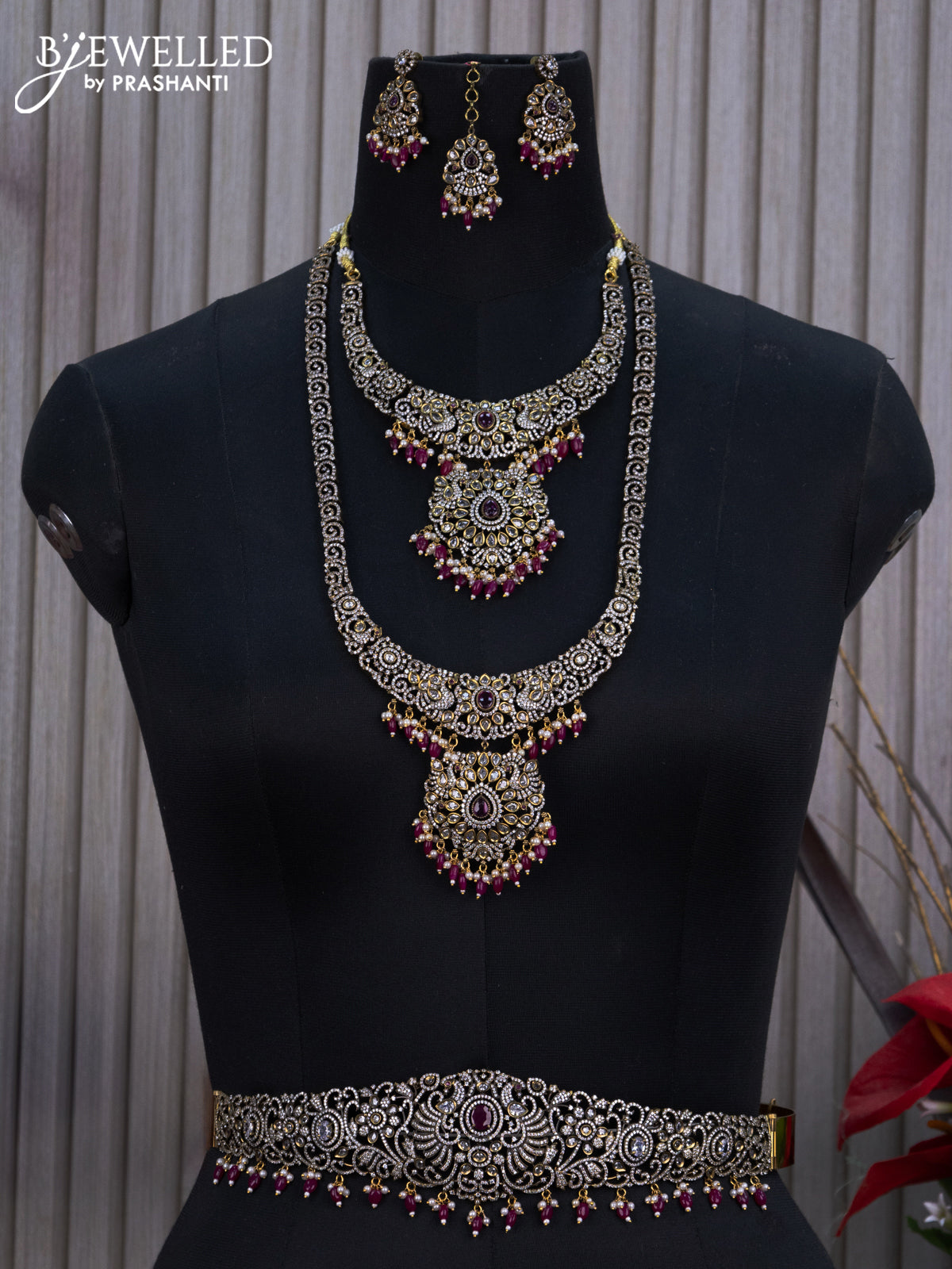 Bridal set peacock design with ruby & cz stones and beads hangings in victorian finish