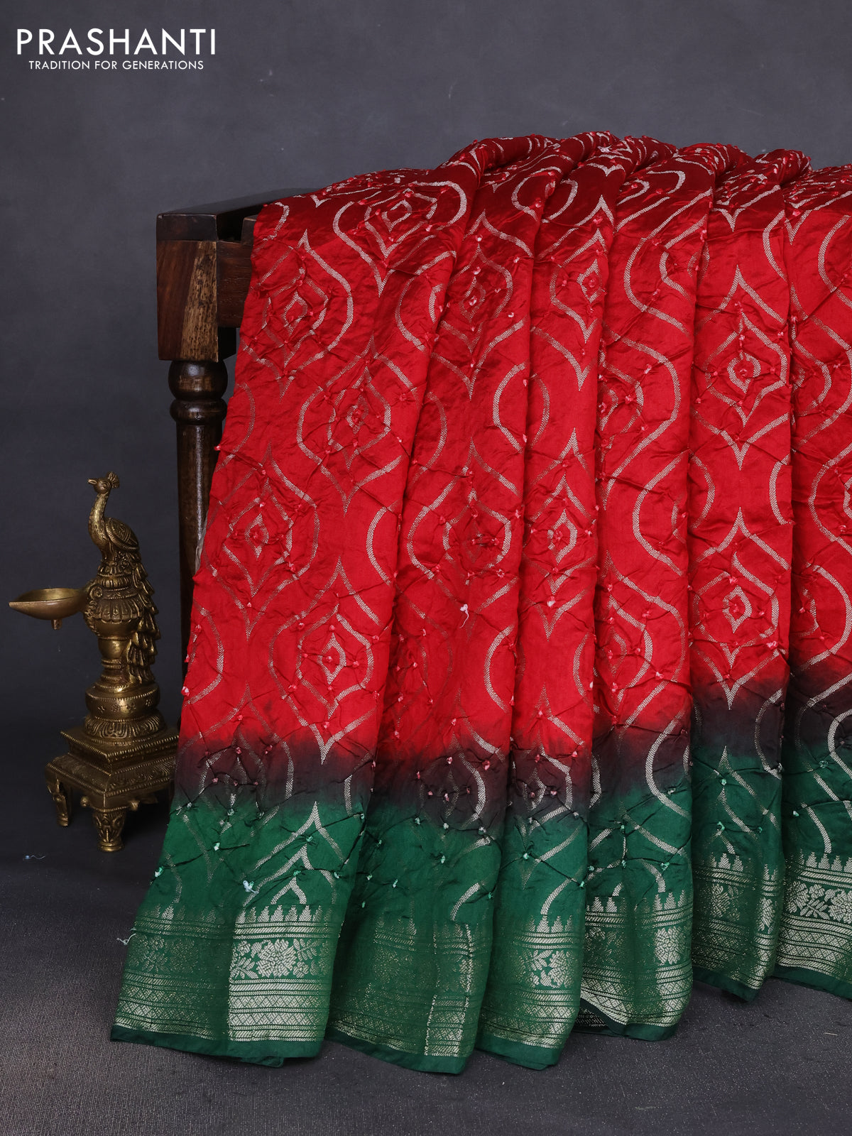 Chiniya silk saree red and green with allover bandhani prints & zari weaves and zari woven border