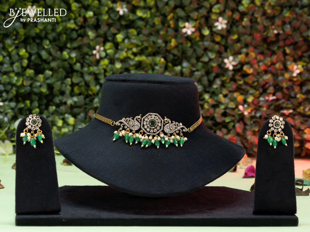 Choker peacock design with emerald & cz stones and pearl hangings in victorian finish