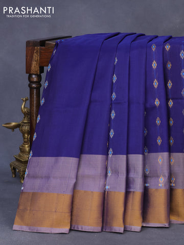 Pure uppada silk saree dark blue and peach pink with allover zari woven floral buttas and zari woven border