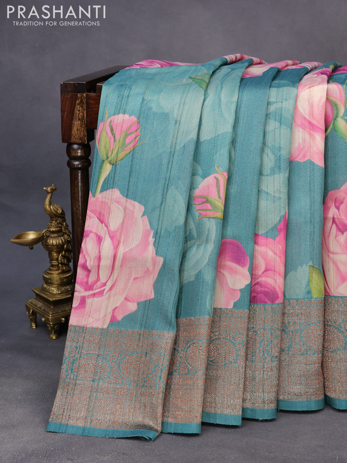 Banarasi tussar silk saree teal blue shade with allover floral digital prints and banarasi style border