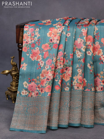 Banarasi tussar silk saree teal blue shade with allover floral digital prints and banarasi style border