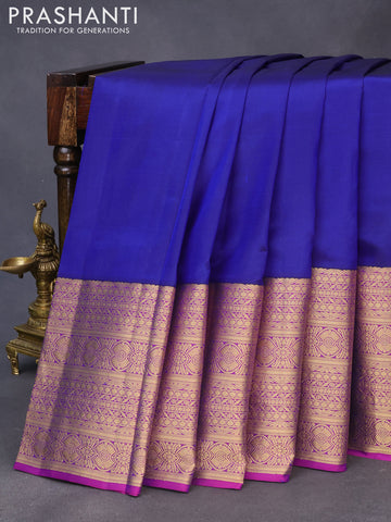 Pure kanchipuram silk saree blue and purple with plain body and long zari woven border