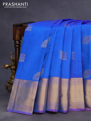 Pure kanchipuram silk saree blue and dual shade of purple with allover self emboss & buttas and rich zari woven border