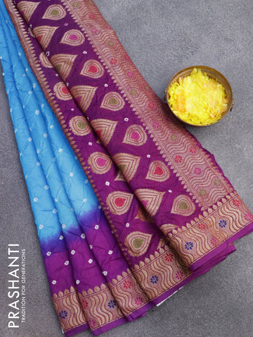 Bandhani saree cs blue and purple with allover bandhani prints and banarasi style border