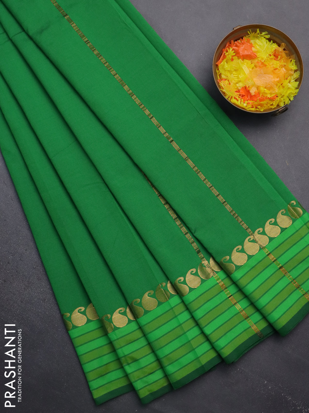 Arani semi silk saree green and light green with plain body and paisley zari woven simple border