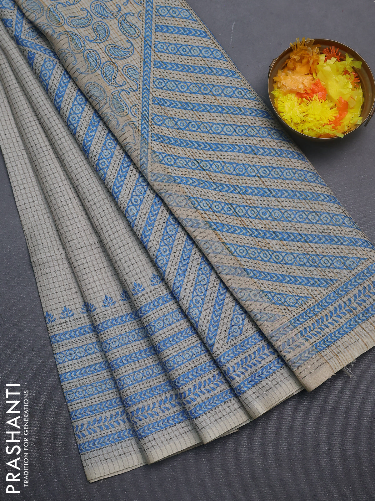 Chappa saree beige and cs blue with allover small zari checked pattern and printed border