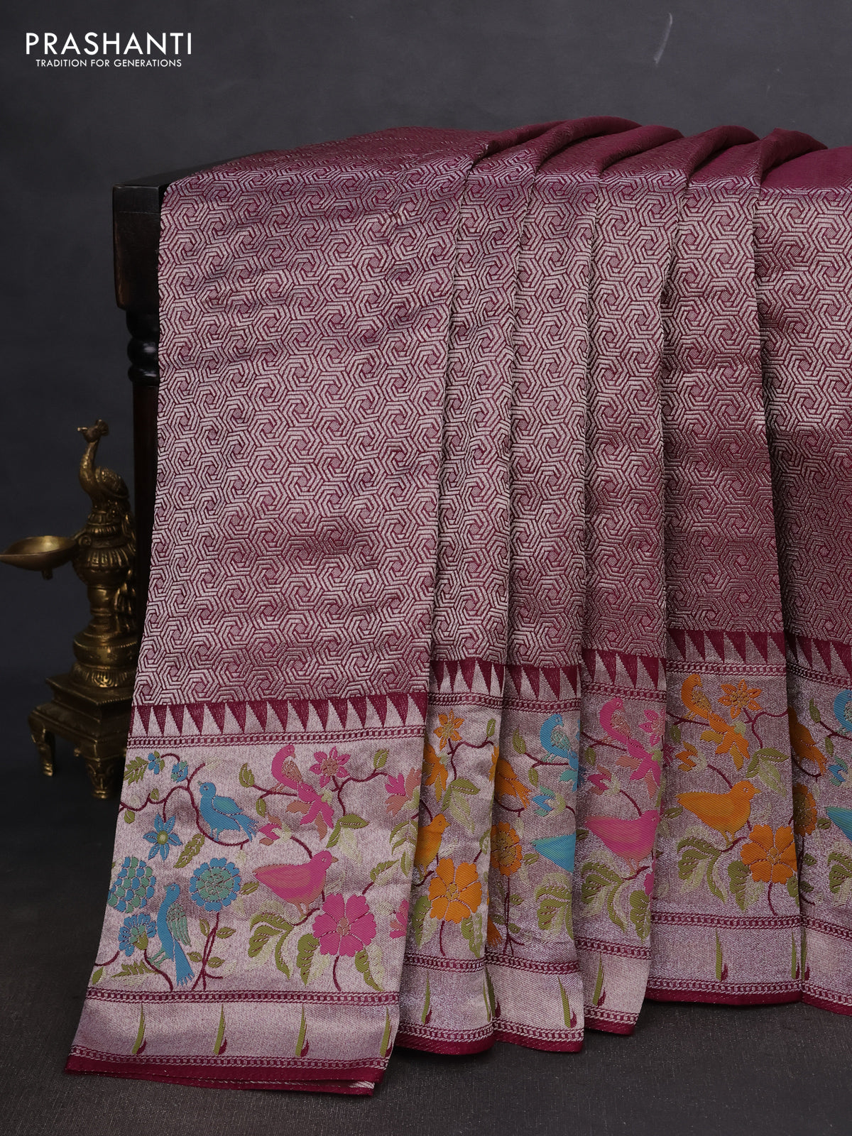 Banarasi semi raw silk saree wine shade with allover silver woven brocade weaves and floral design paithani border