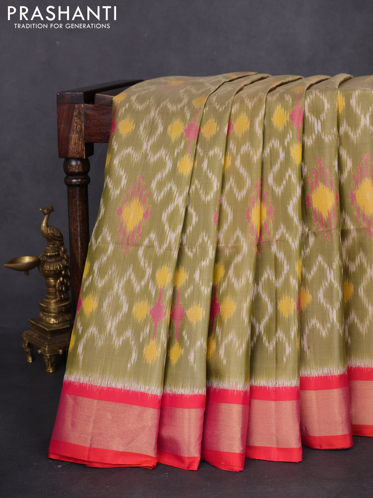 Ikat soft silk saree elaichi green and pink with allover ikat weaves and long zari woven ikat style border