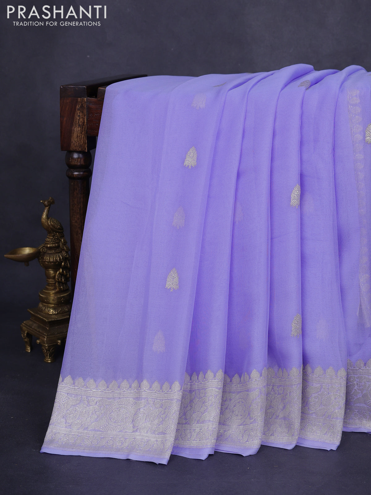 Banarasi chiffon silk saree lavender shade with silver zari woven buttas and silver zari woven border