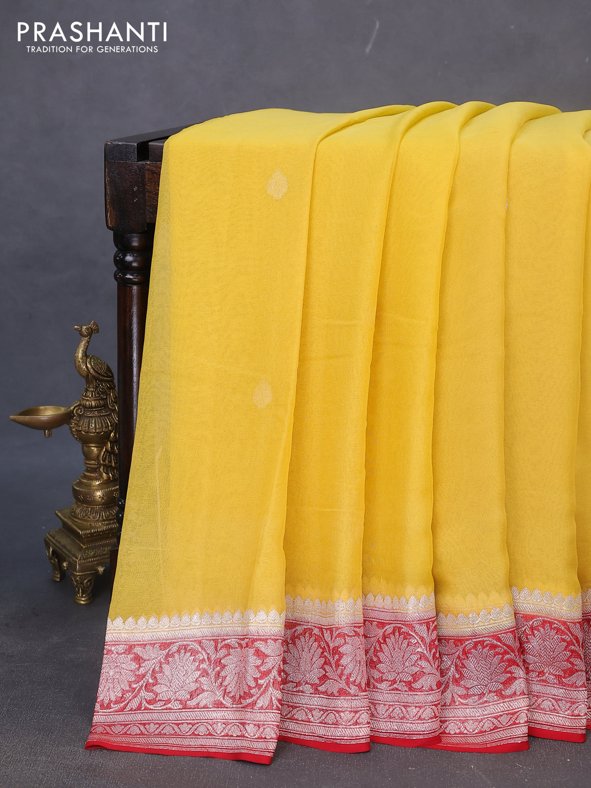 Banarasi chiffon silk saree yellow and kumkum red with silver zari woven buttas and silver zari woven border