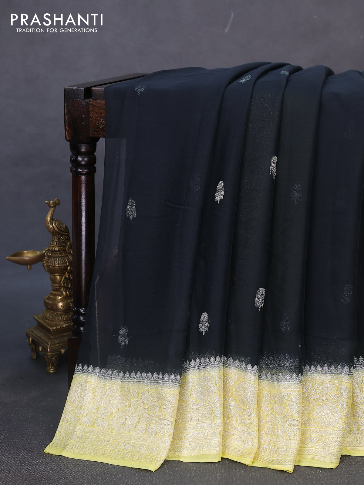 Banarasi chiffon silk saree black and pale yellow with silver zari woven buttas and floral silver zari woven border