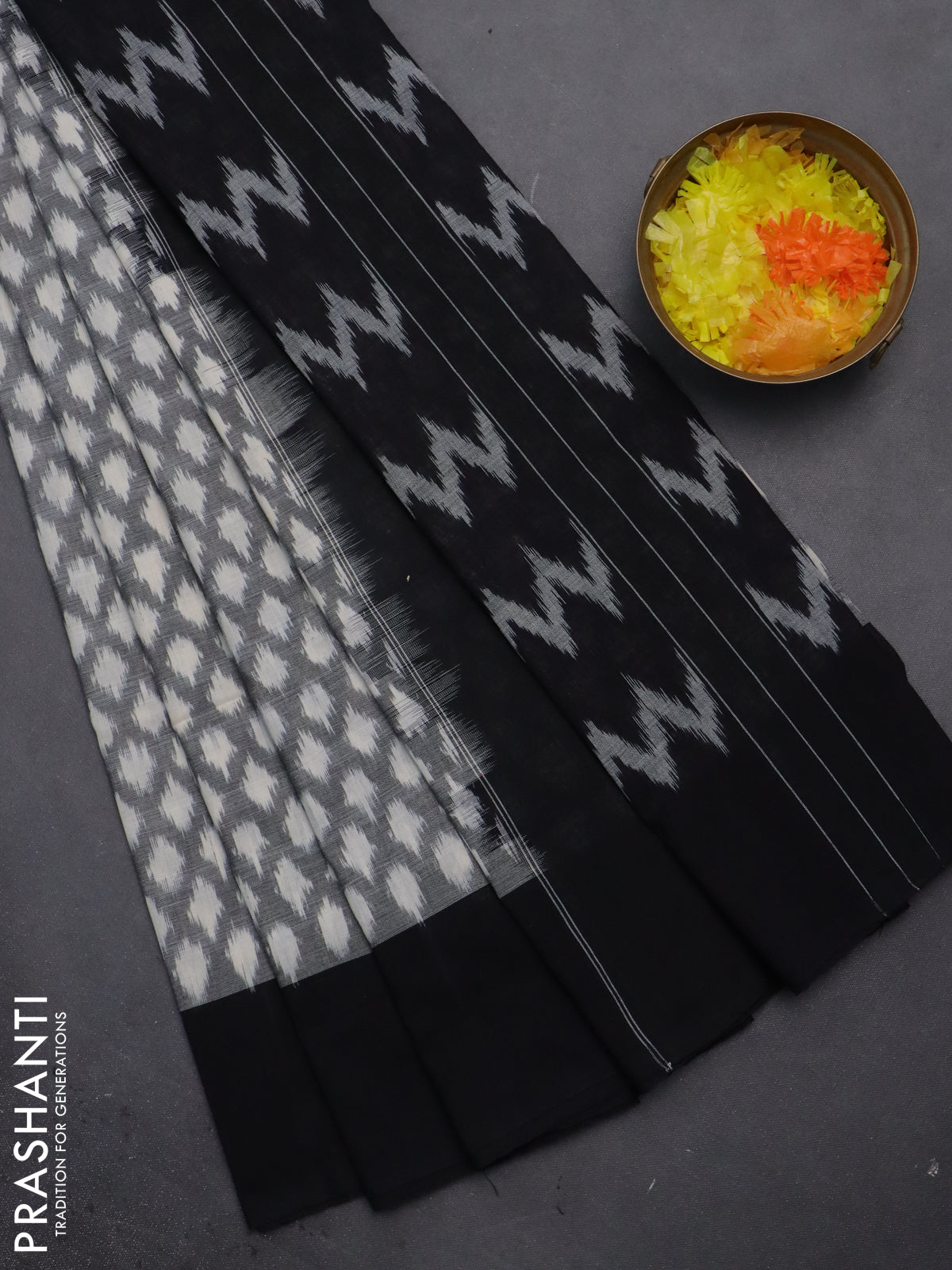 Ikat cotton saree grey with allover ikat weaves and ganga jamuna border