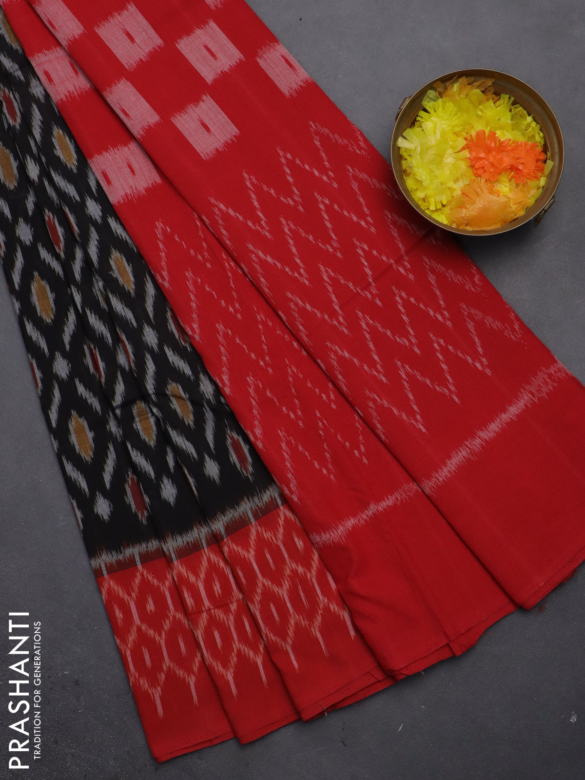 Ikat cotton saree black and red with allover ikat weaves and simple border