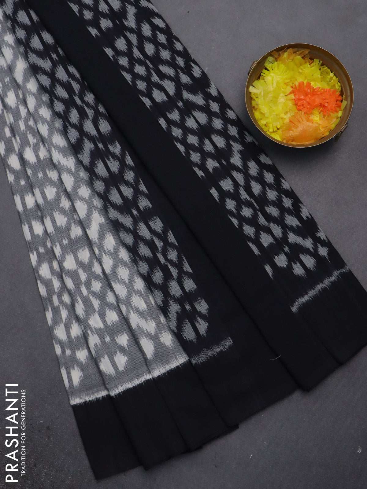 Ikat cotton saree grey and black with allover ikat weaves and simple border