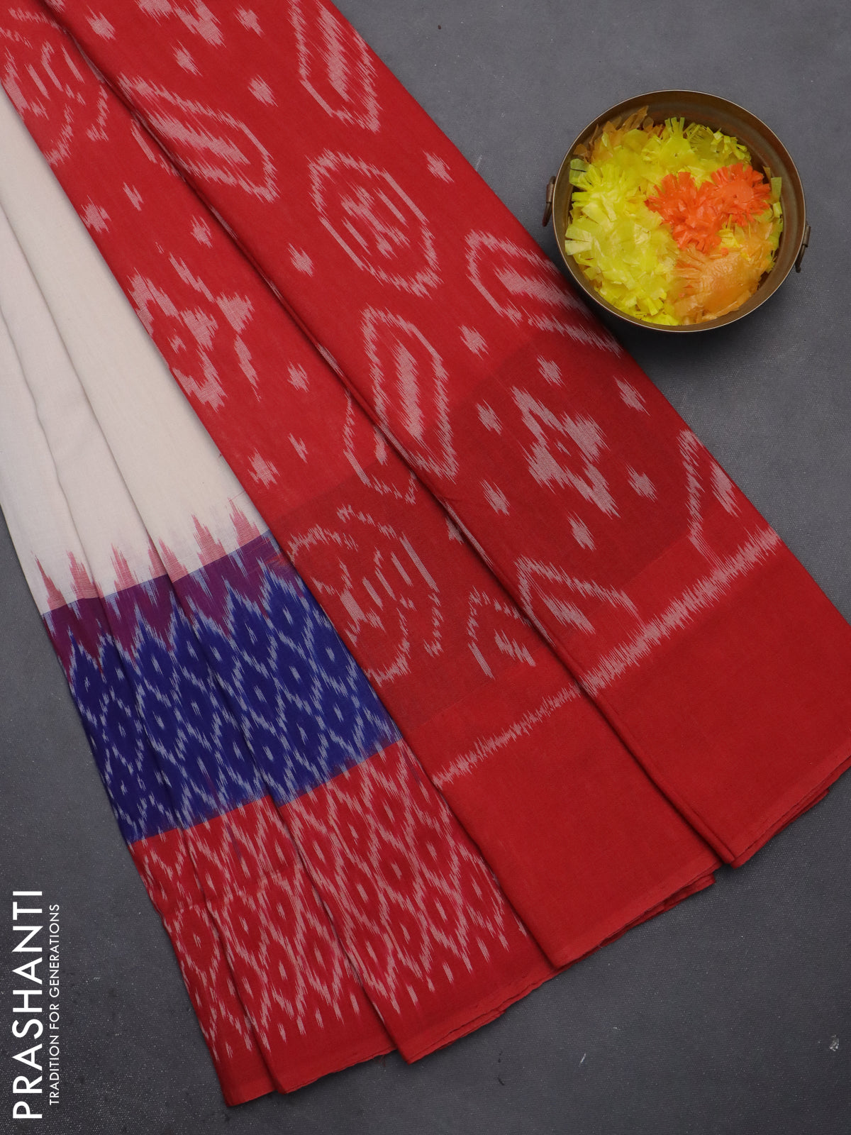 Ikat cotton saree cream and blue red with plain body and long ikat style border