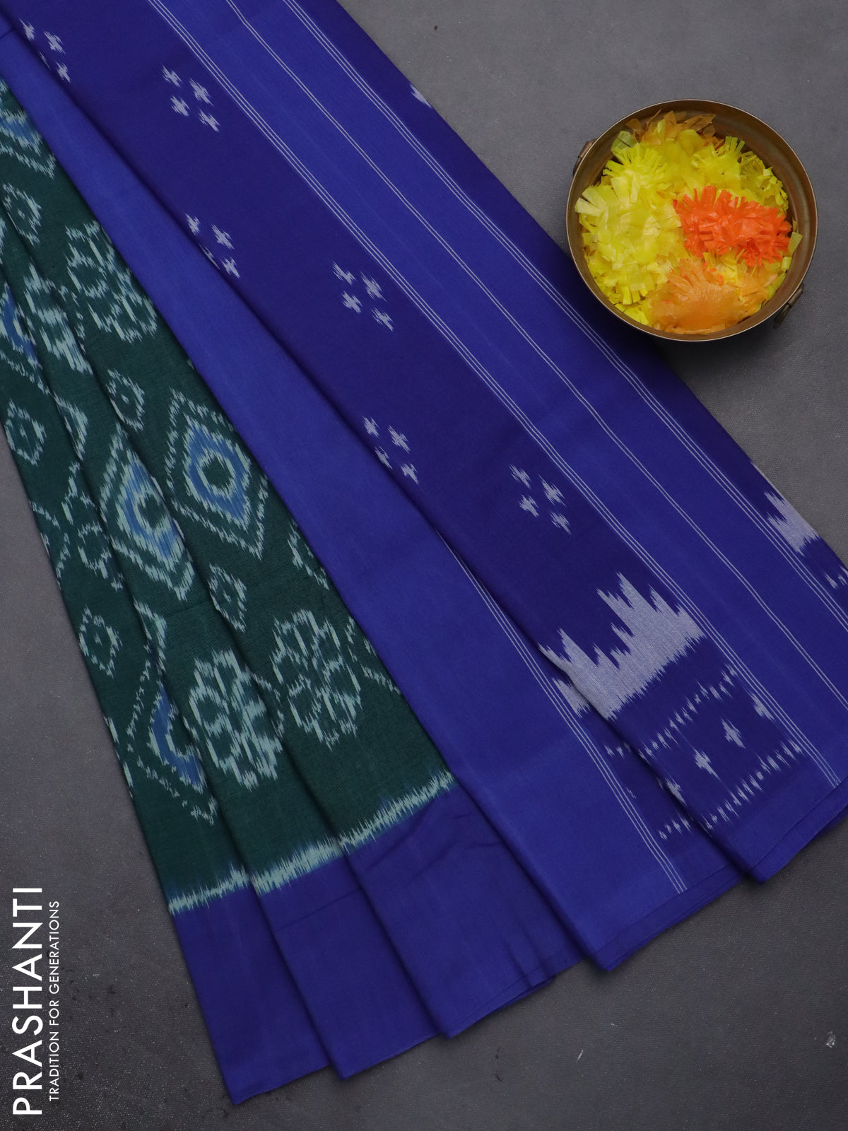 Ikat cotton saree green and blue with allover ikat weaves and simple border