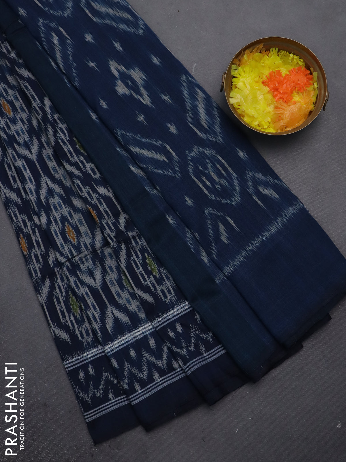 Ikat cotton saree peacock blue with allover ikat weaves and ikat style border