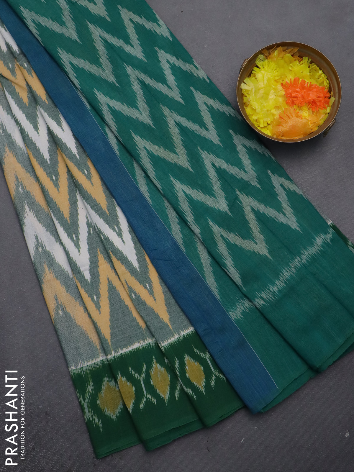 Ikat cotton saree green shade with allover ikat weaves and simple border