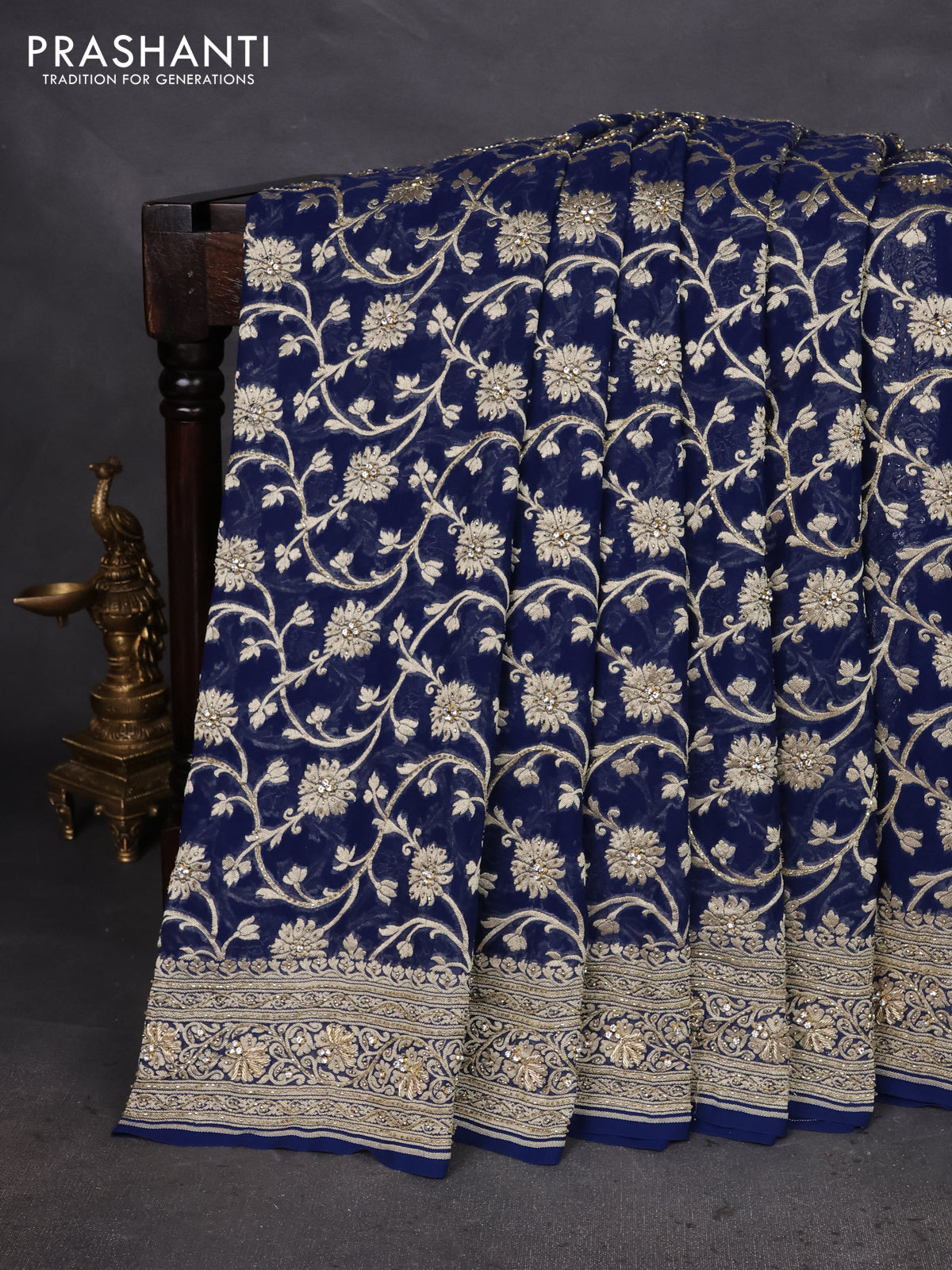 Banarasi georgette saree peacock blue with allover jaal weaves & stone work and zardosi work border