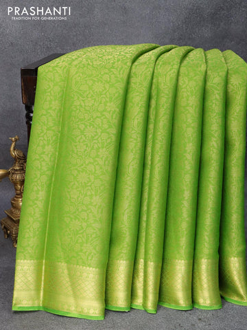 Art chiffon saree light green with allover zari woven brocade weaves and zari woven border