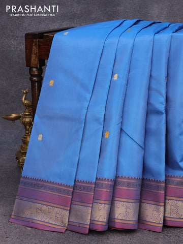 Pure kanjivaram silk saree blue and dual shade of bluish red with thread woven buttas and thread woven border