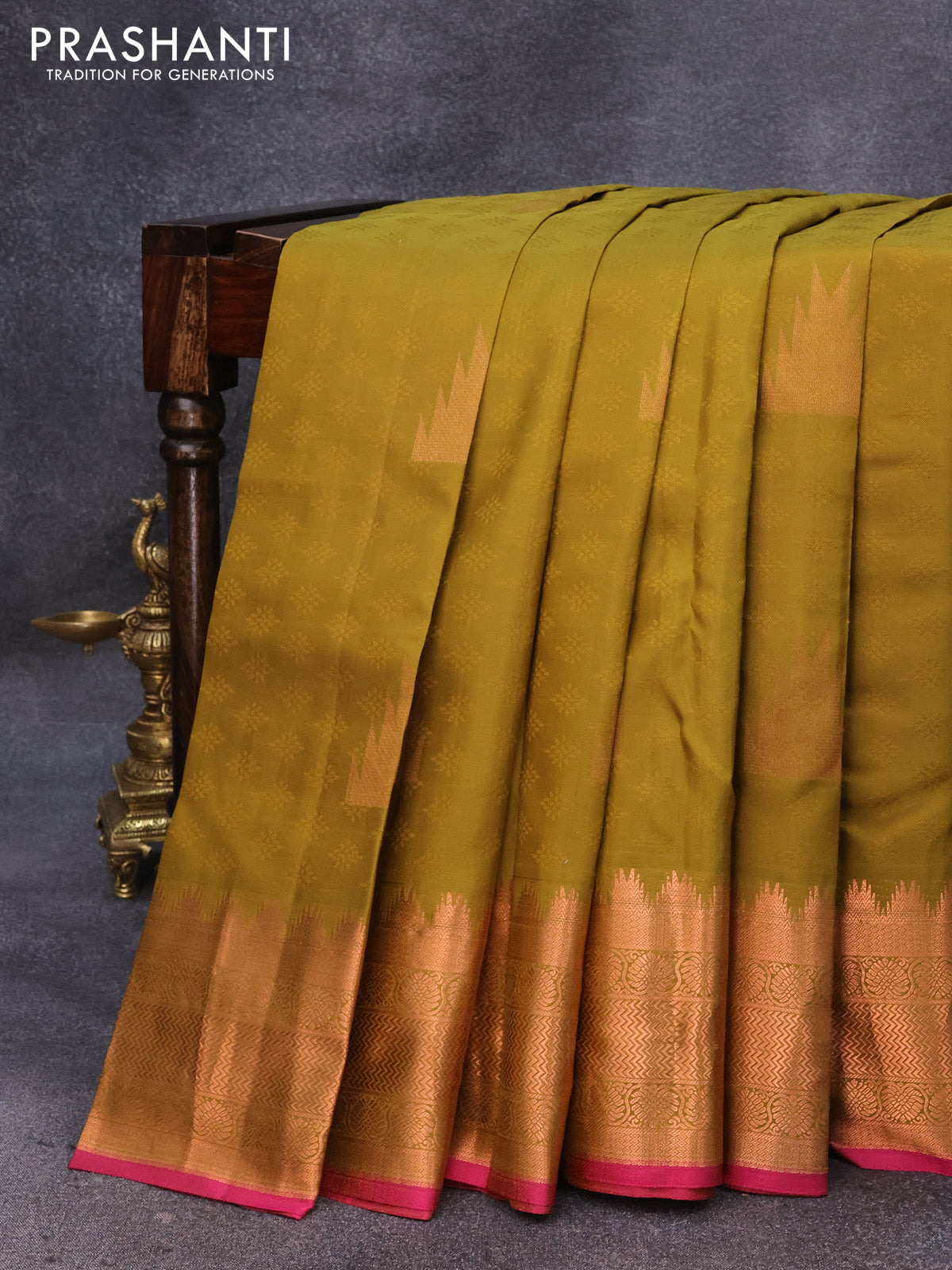 Pure kanjivaram silk saree mustard green and pink with allover self emboss & temple zari buttas and copper zari woven border