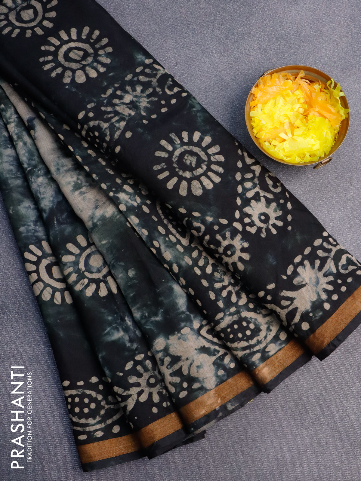 Muslin cotton saree dark beige and dark peacock green with tie and dye & batik butta prints and small zari woven border