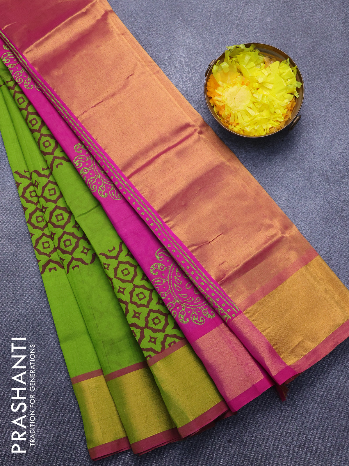 Silk cotton block printed saree light green and pink with allover prints and zari woven border