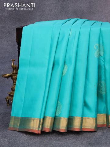 Pure kanjivaram silk saree teal blue and dual shade of pinkish orange with paisley zari woven buttas and zari woven border