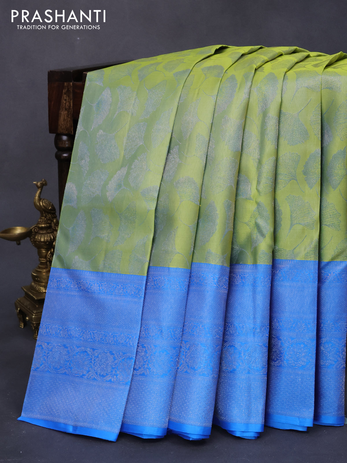 Pure kanjivaram silk saree light green and cs blue with allover silver zari woven butta weaves and silver zari woven border