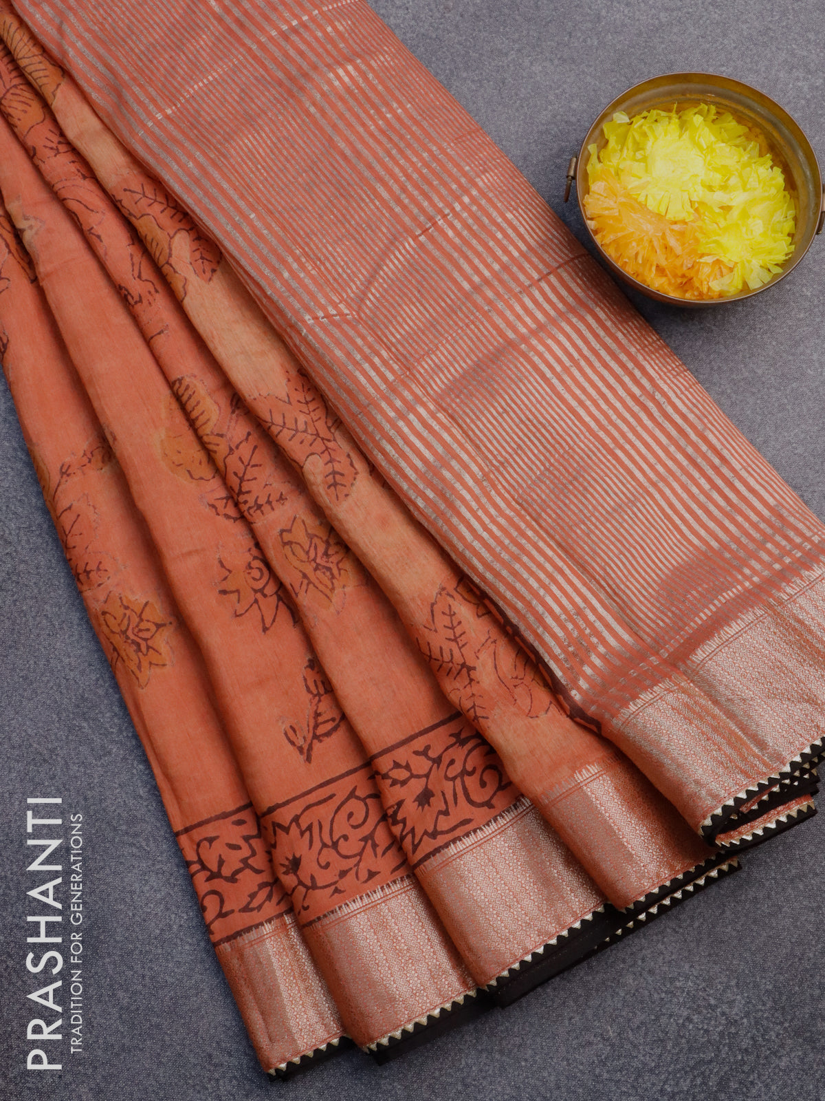 Chanderi silk cotton saree rustic orange and black with natural vegetable prints and zari woven gotapatti lace border