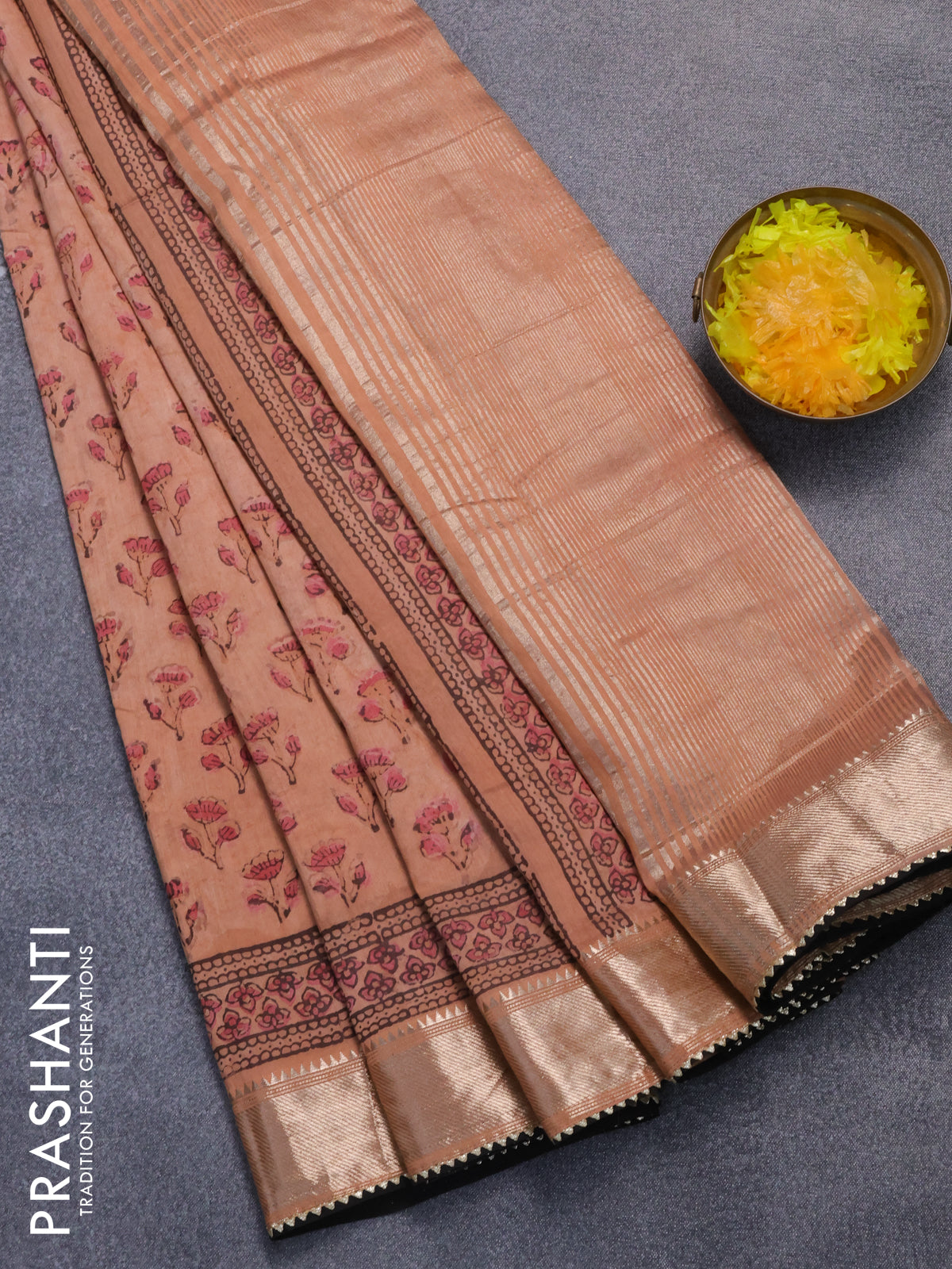 Chanderi silk cotton saree pastel peach and black with natural vegetable prints and zari woven gotapatti lace border