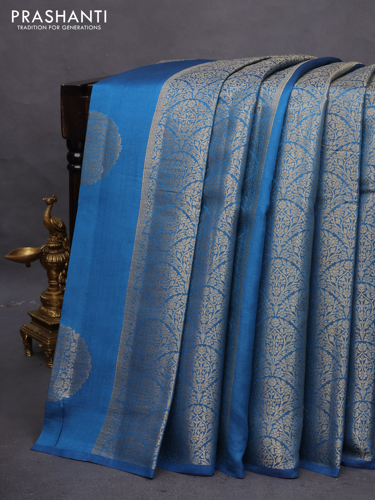 Chiniya silk saree peacock blue with allover zari weaves & buttas in borderless style