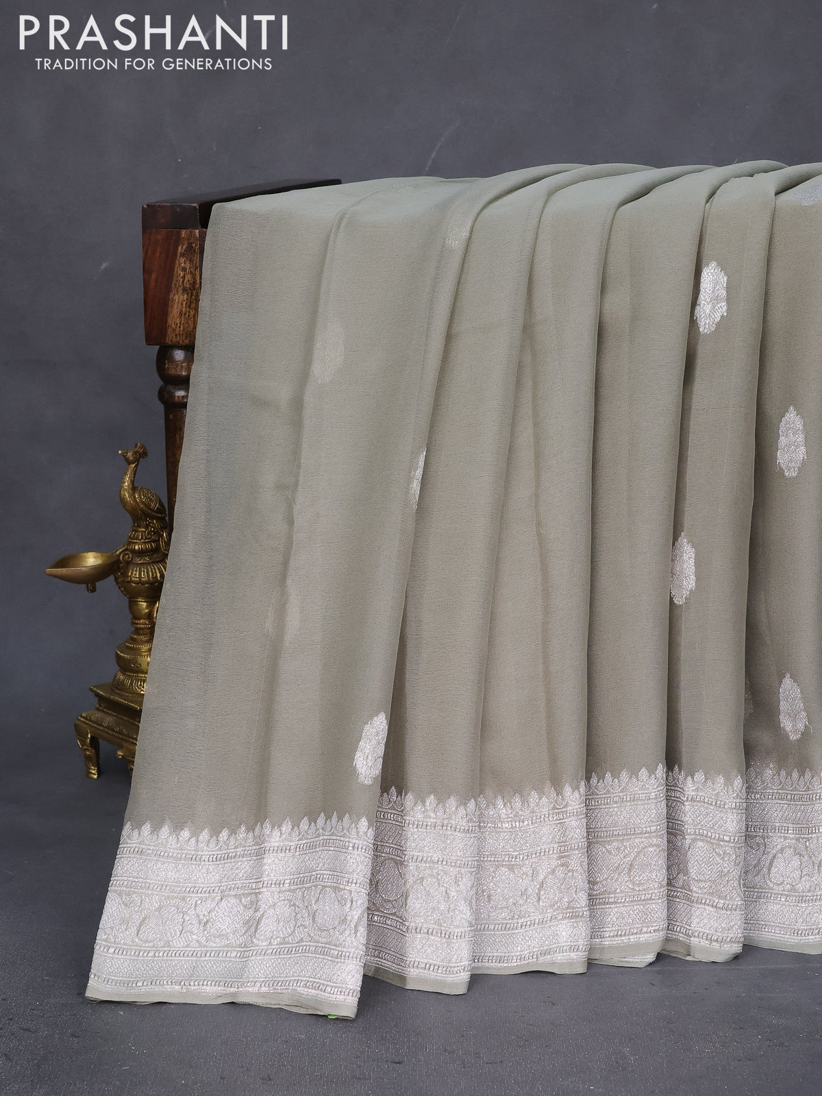 Banarasi chiffon saree grey shade with silver zari woven buttas and silver zari woven border
