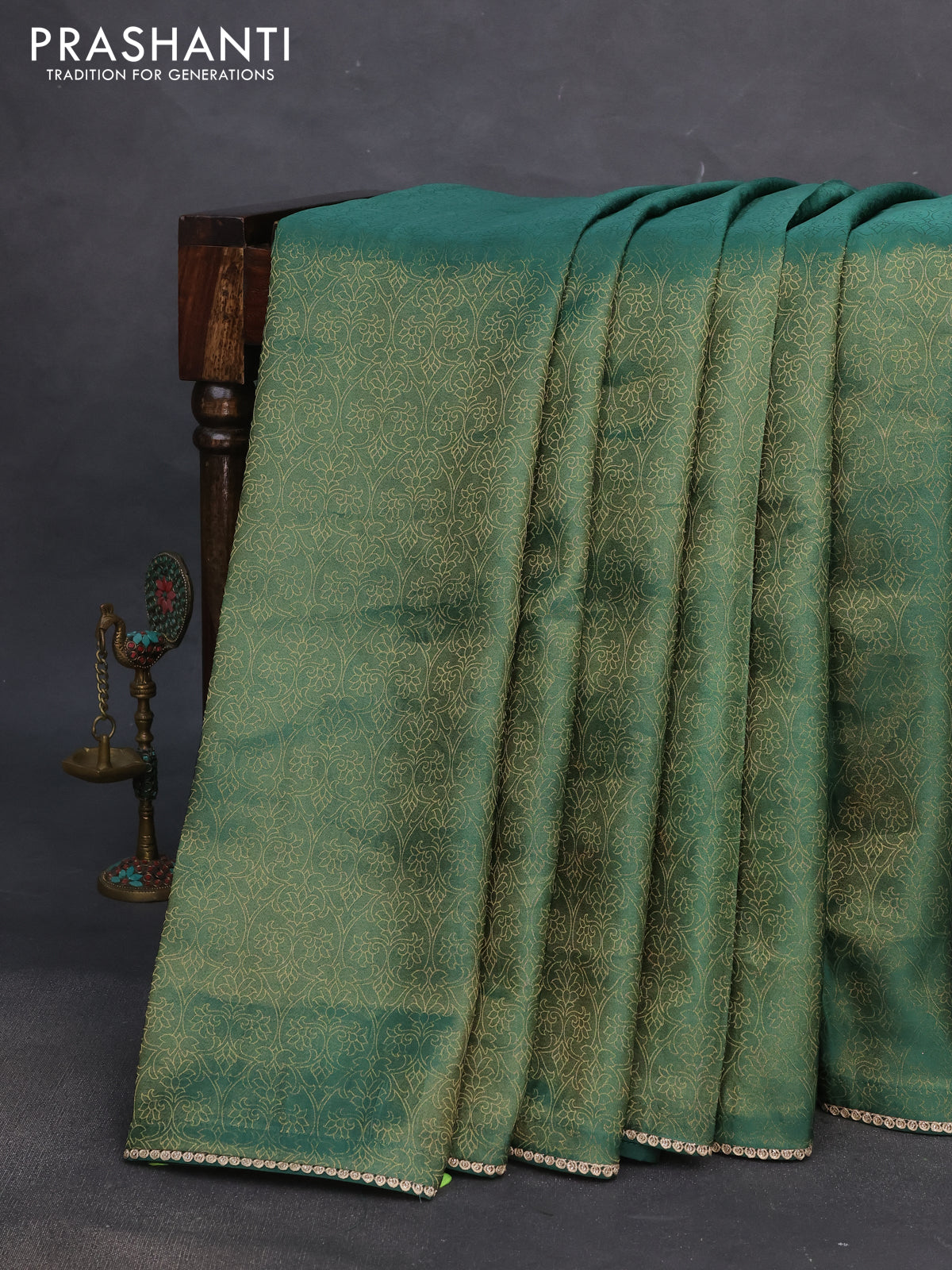 Banarasi semi crepe saree green with allover zari woven brocade weaves and lace work border
