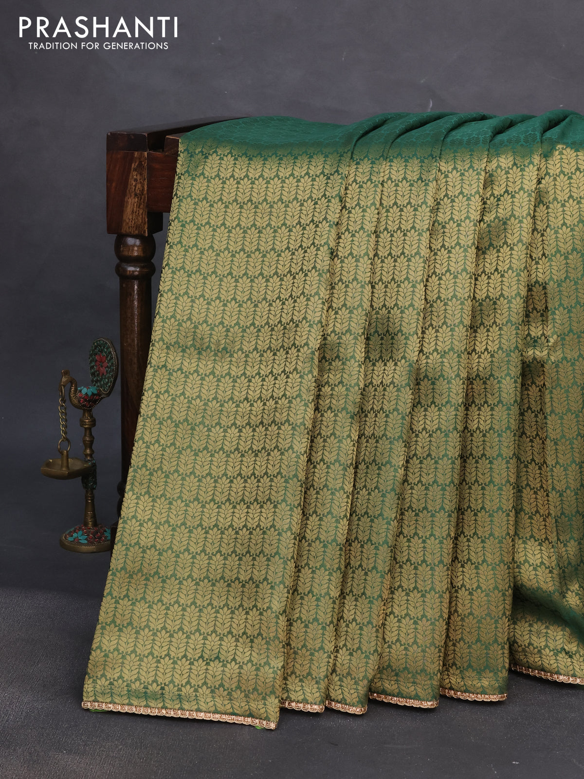 Banarasi semi crepe saree green with allover zari woven brocade weaves and lace work border