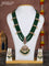 Beaded multilayer green necklace floral pendant with kemp & cz stones and pearl hangings in victorian finish