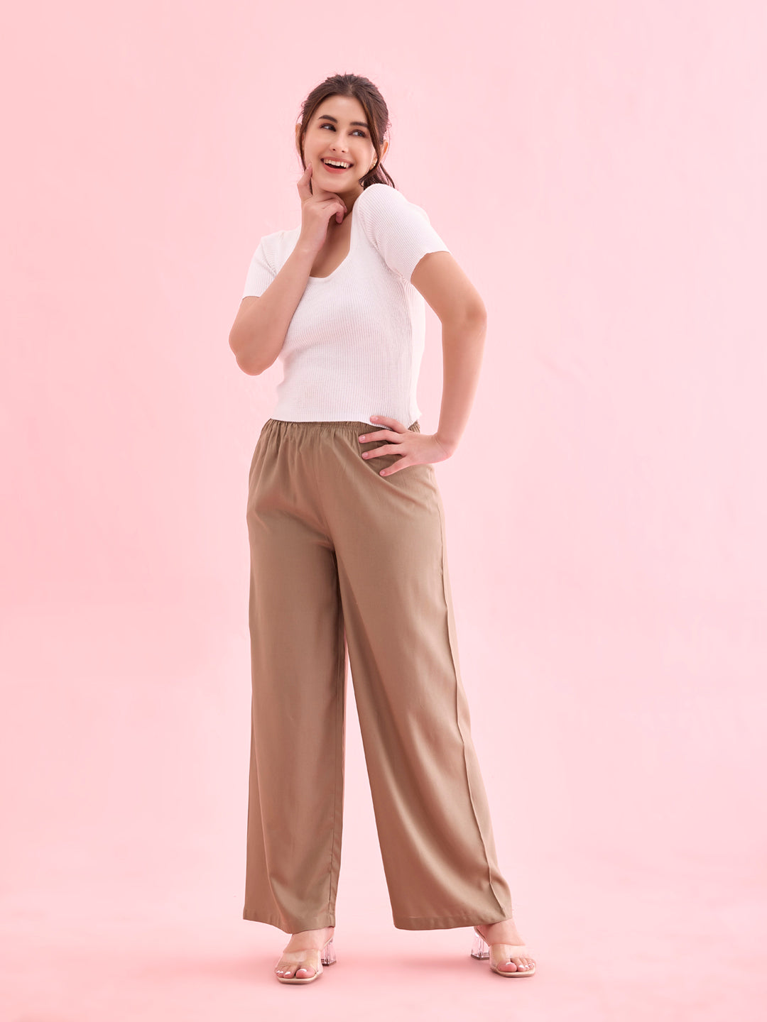 Women Beige Solid Viscose Knit Mid Rise Palazzos