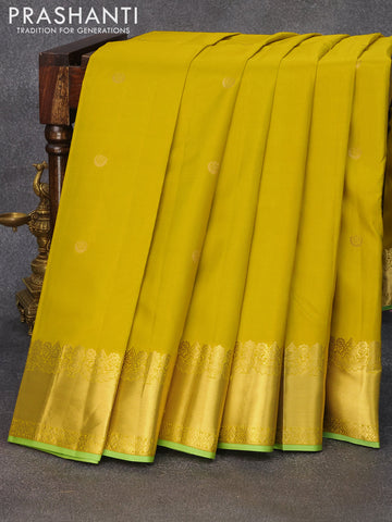 Pure kanjivaram silk saree lime yellow and pista green with zari woven buttas and zari woven border & Butta style