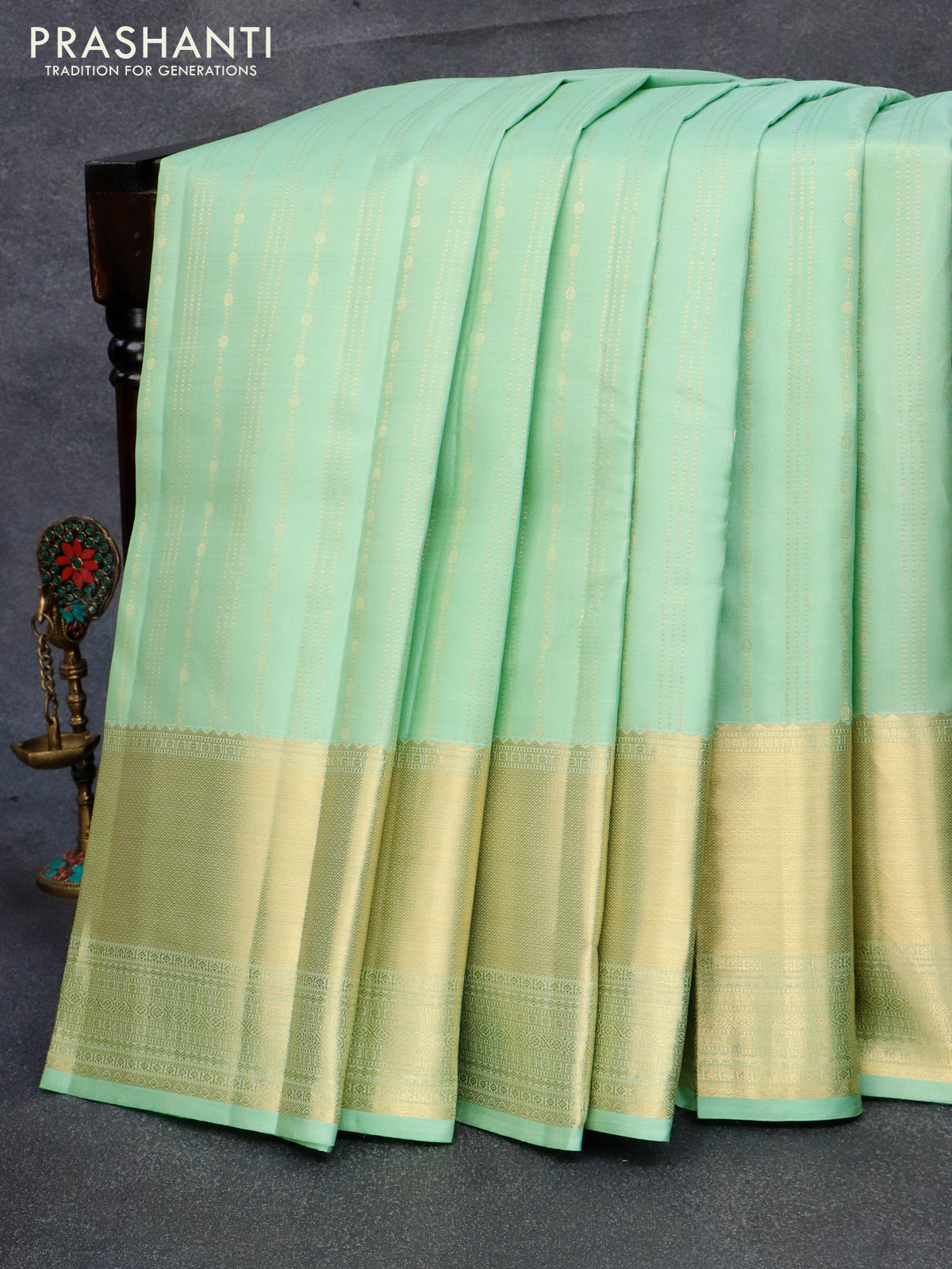 Pure kanjivaram silk saree pastel green with allover zari weaves and zari woven border