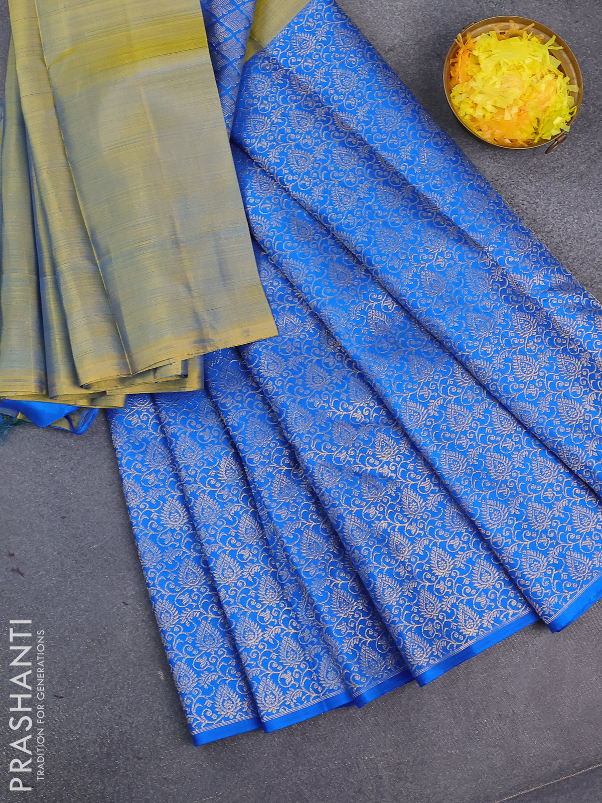 Pure kanjivaram silk saree dual shade of bluish yellow and blue with half & half style and long zari woven border half & half style